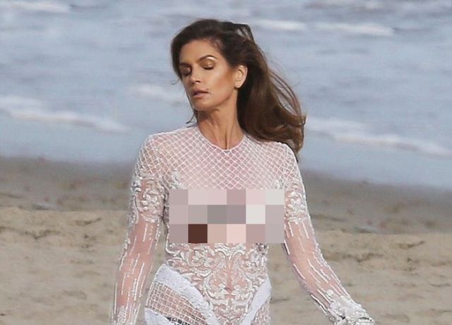 Cindy Crawford Goes Braless on the Beach